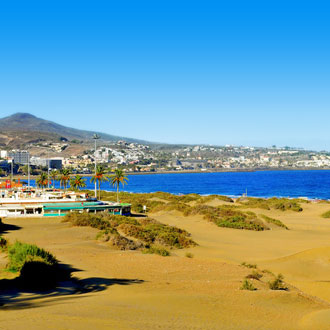 Uitzicht op Playa del Ingles vanuit de duinen