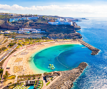 <p>Strand op Gran Canaria tijdens een all inclusive vakantie</p>